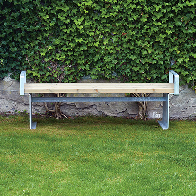 A bench with steel handles and frame on top of grass at a park.